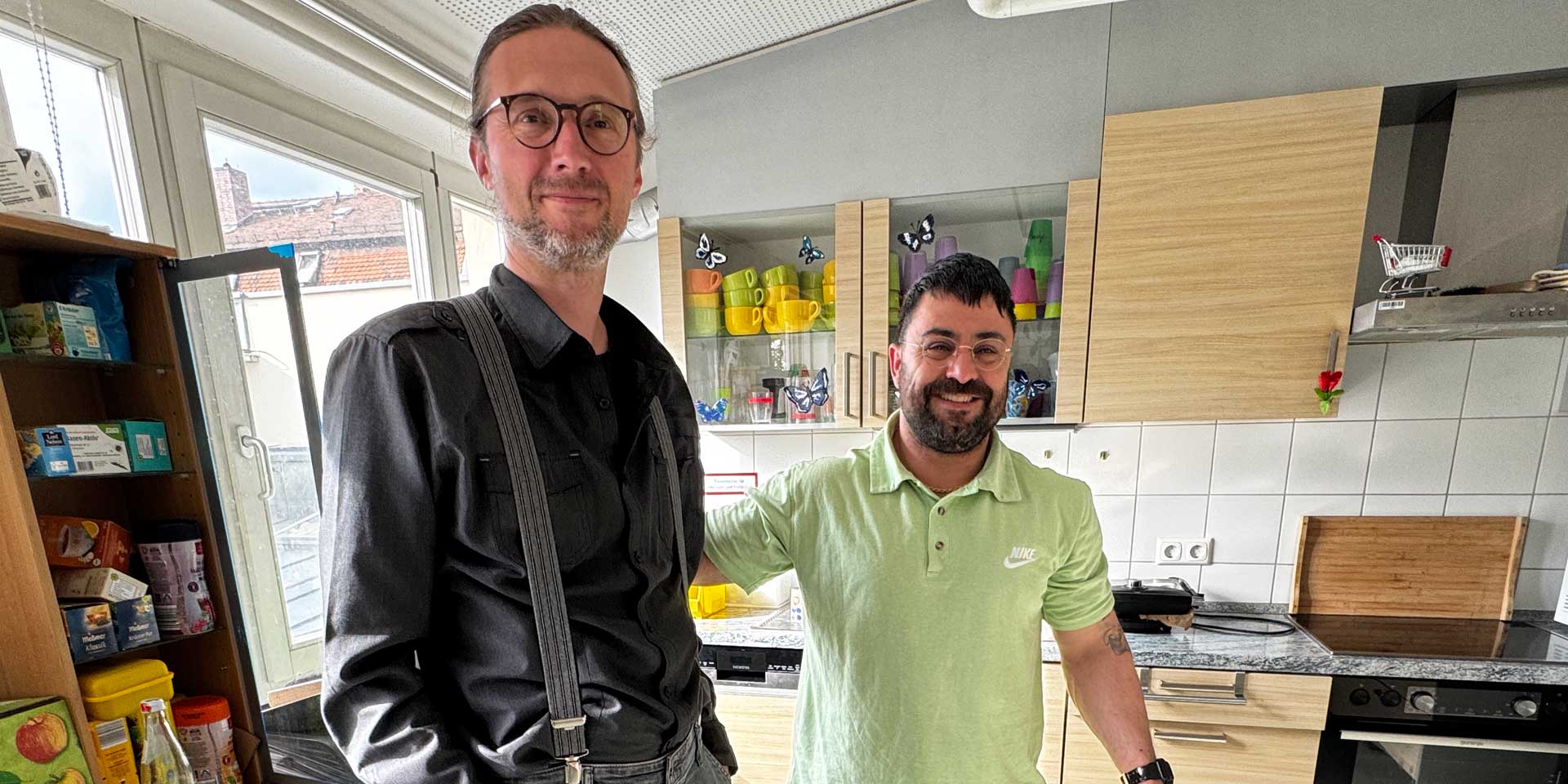 Yousef Naderlo und Pfarrer Otto Guggemos